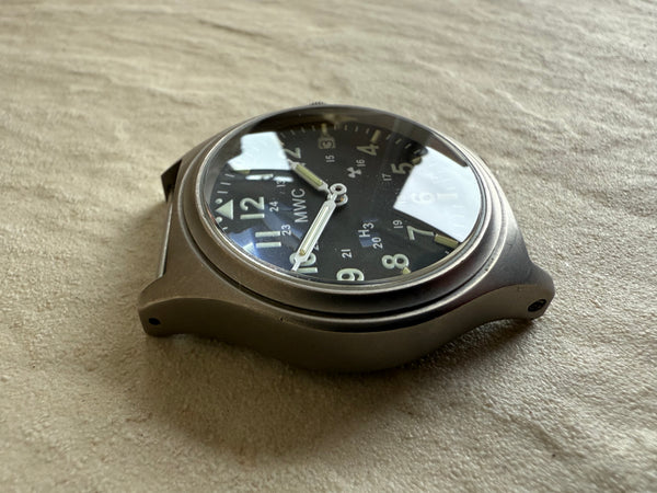 MWC Titanium General Service Watch with 300m Water Resistance, 10 Year Battery Life, GTLS, Sapphire Crystal and 12/24 Dial Format - Needs Hand Resetting but Running Fine