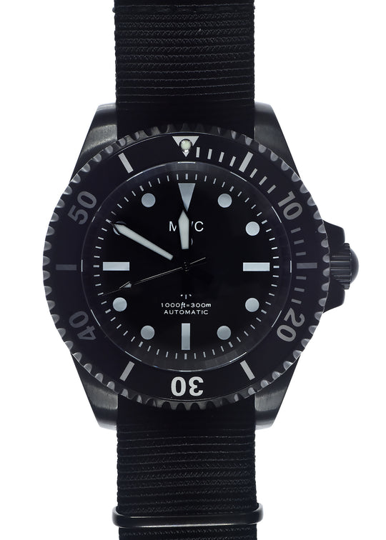 MWC 24 Jewel 1982 Pattern 300m Automatic Military Divers Watch in Black PVD with a Sapphire Crystal on a NATO Webbing Strap (Non Date Version)